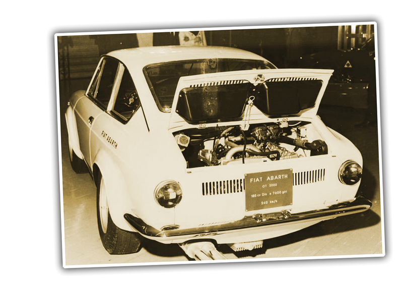 Illustration for article titled This Fantastic Little Abarth Had The Cleverest Spare Tire Placement Ever And Everything Else Is Great, Too